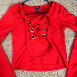 Red lace up crop long sleeved shirt